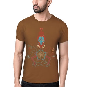 May include: A brown t-shirt with a graphic print of a blue and red deity with multiple arms and a geometric design in the center.