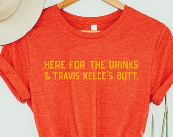 The ORIGINAL* Here For The Drinks & Travis Kelce's Butt | Kansas City Pride Shirt | Unisex Short Sleeved Shirt | Made To Order