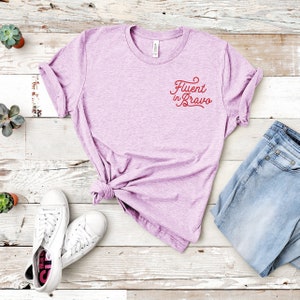 Fluent In Bravo Bravo Tee Unisex Short Sleeved Shirt Multiple Color Options Made To Order Lilac w/ Red Text