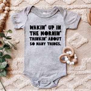Wakin' Up In The Mornin' Thinkin' About So Many Things RHONJ Baby One Piece Multiple Color Options Made To Order Grey w/ Black Text