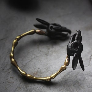 Black Rabbit Skulls Handcuff by Defy , Charm Rabbit Skulls Bracelet ...