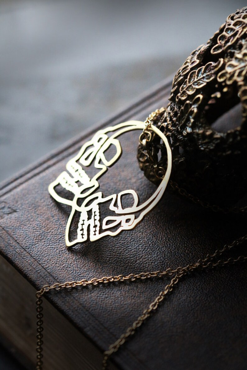 The Dark Graphic Skulls Necklace All handmade original design and made by Defy Jewelry Skulls Necklace by Defy Small Size