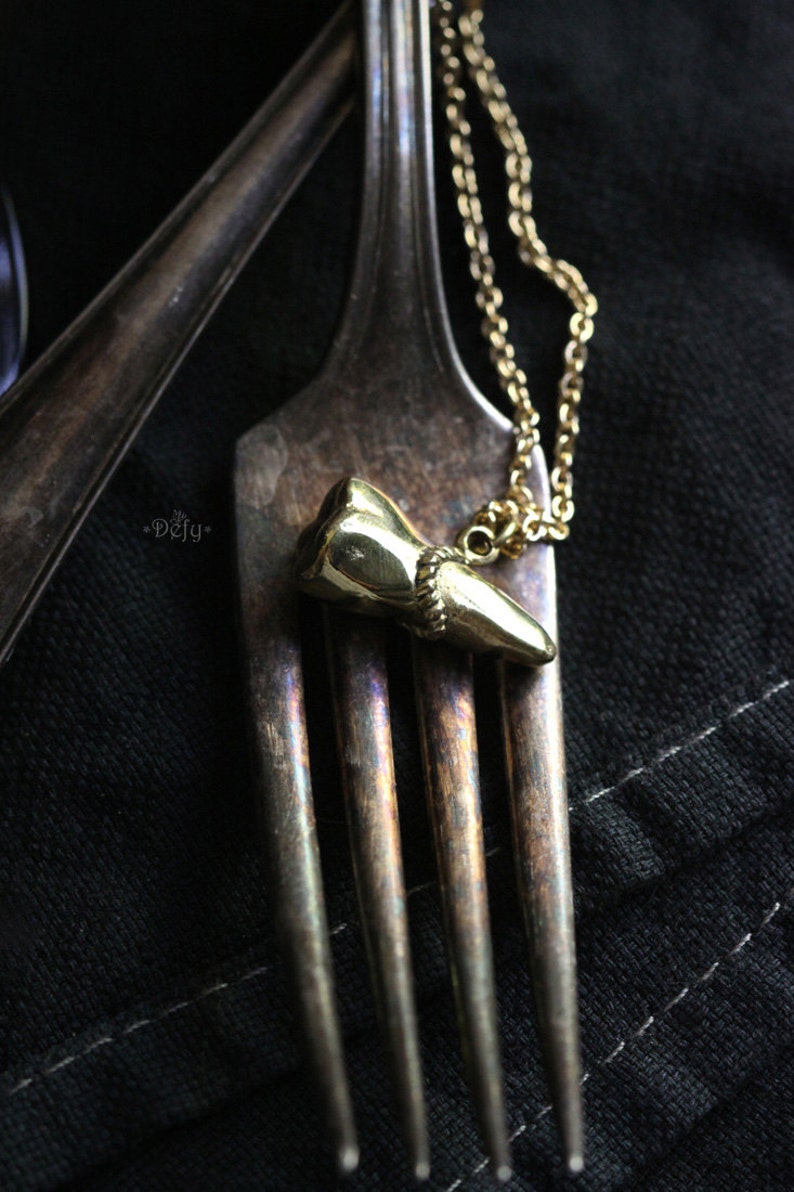 A Tooth Charm Necklace by Defy Original Brass Handmade Jewelry