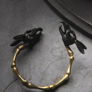 Black Rabbit Skulls Handcuff by Defy , Charm Rabbit Skulls Bracelet ...
