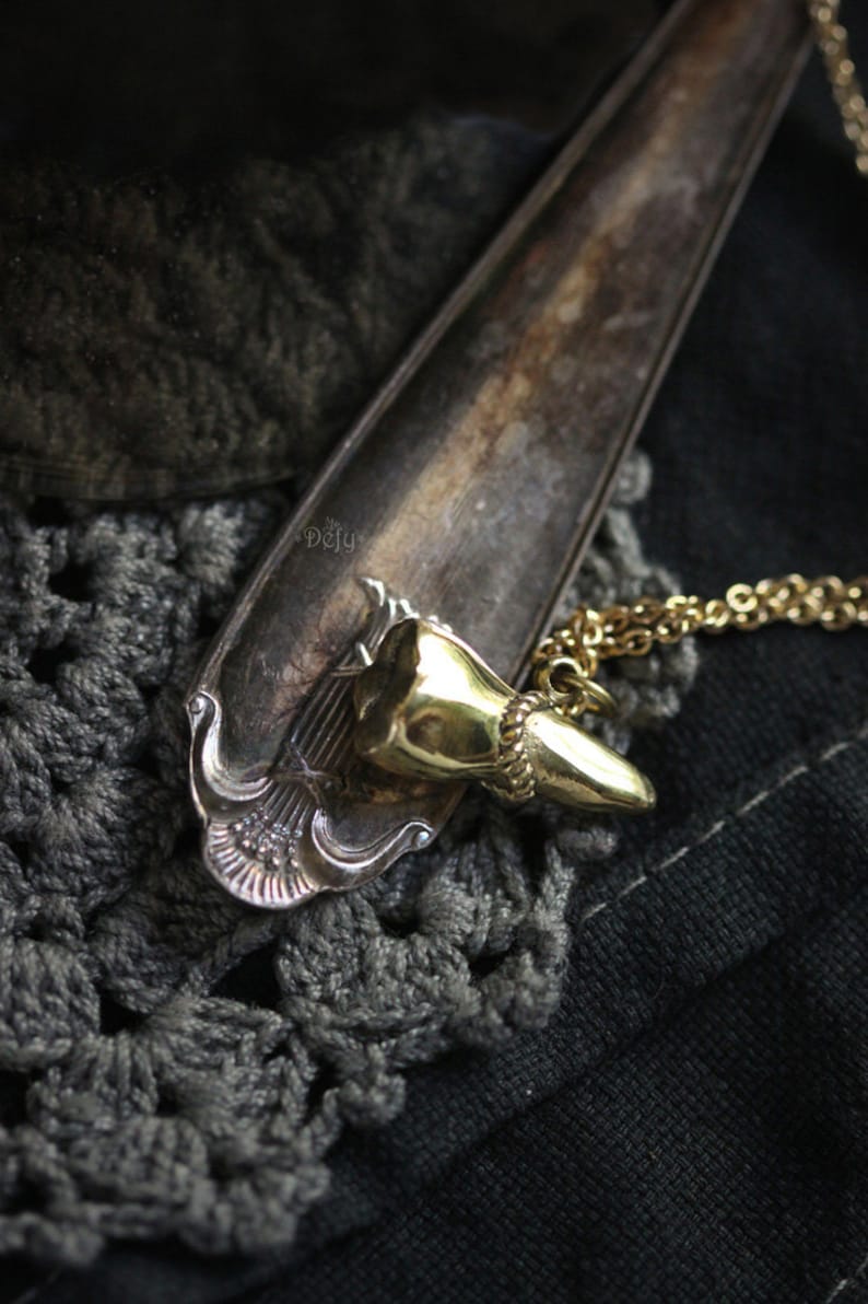 A Tooth Charm Necklace by Defy Original Brass Handmade Jewelry