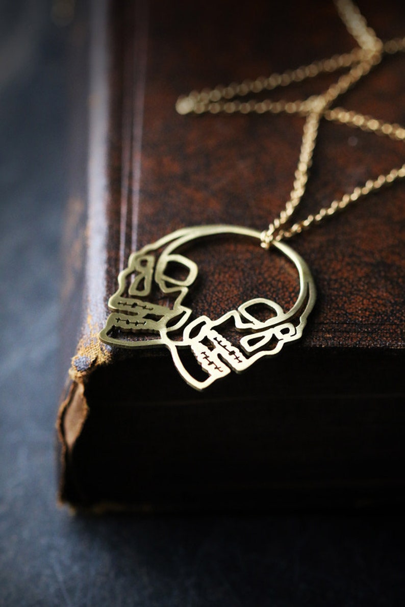 The Dark Graphic Skulls Necklace All handmade original design and made by Defy Jewelry Skulls Necklace by Defy Small Size