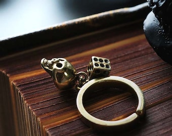 Small skull and dice ring. /Brass,Gold and Silver color / adjustable size / Original made and designed by Defy.