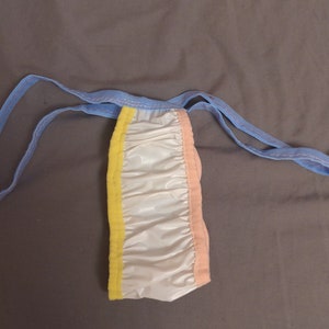 Waterproof  soft white plastic slimline tanga   (29-38)