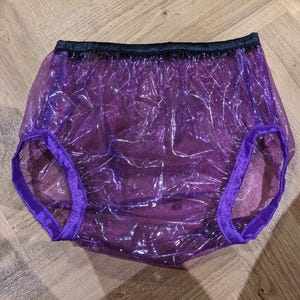 Pantalones de plástico de vidrio morado impermeables (26-41)