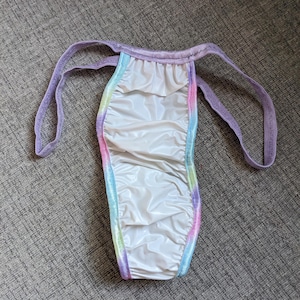 Unisex  white plastic thong (30-35)