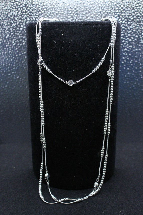 Three-Strand Silver Tone Necklace with Small Beads