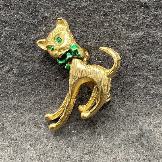 Gold Tone Movable Head Cat with Green Rhinestone … - image 1