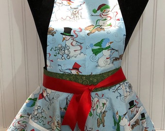 Child’s Full Apron circle skirt style Christmas apron blue snowman sparkle print red ribbon ties green swirl underskirt