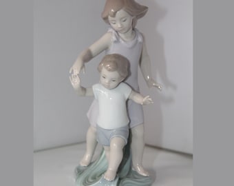 Lladro  Let Me Help You Porcelain Figurine In Original Box – Retired - 8214