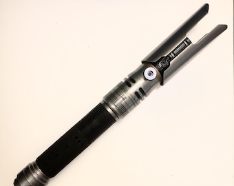 Sable de luz Legacy de Cal Kestis de Star Wars Galaxy's Edge: mejora del pomo de la secuela de Jedi Survivor