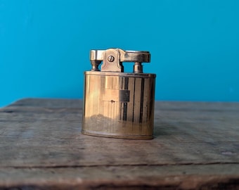 Vintage Refillable Lighter, Auer Champion Japan, Gold Tone 2" x 1 1/2" x 1/2"