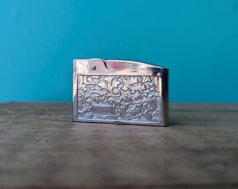 Vintage Refillable Lighter, de Luxe Japan, Silver Tone 2" x 1 1/4" x 1/4"