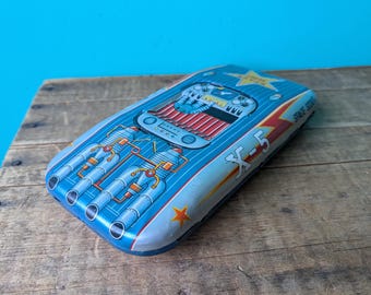1960s Tin Friction Suzuki and Edwards X-5 Space Scout, Made in Japan,  9" x 4 1/2" x 1 /4"