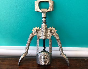 Mid-century Modern Silver Wine Bottle Opener Corkscrew with Bacchus Design. Italy