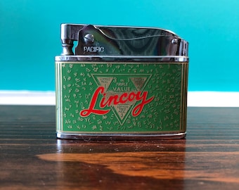 Nixon Lincoy Feeds -  Pacific- Advertisement Lighter, Made in Japan
