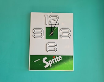 1970s Sprite Wall Clock Battery Operated French Language Made in Canada