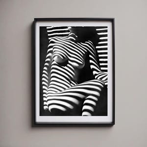 May include: Black and white photograph of a person's body with striped shadows cast on it.
