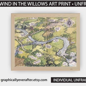 May include: An unframed art print of a map from "Wind in the Willows." The map shows a river, bridges, and locations such as "Toad Hall" and "Wild Wood." The print is in a light wood frame, with text at the top and bottom.