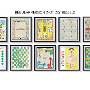 May include: A collection of 10 framed vintage board game illustrations. The games include Candy Land, Monopoly, Cluedo, Twister, Draughts, Sorry!, Operation, and Snakes and Ladders.