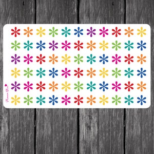 May include: A sheet of colorful star stickers with a rainbow of colors. The stickers are arranged in a grid pattern on a white background.