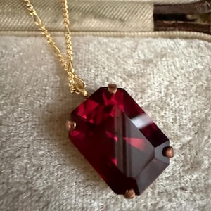 Vintage Ruby red Rectangle Crystal 20 mm  x 15 mm on a gold plated chain.