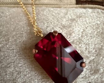 Vintage Ruby red Rectangle Crystal 20 mm  x 15 mm on a gold plated chain.