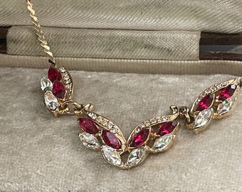 Stunning vintage  crystal and ruby red navette and clear crystal necklace with a gold plated trace chain