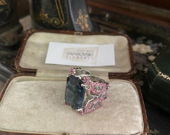 Vintage Montana blue large baguette cut Swarowski Crystal statement   ring, small pink crystals encrusted on the butterfly sides. Adjustable