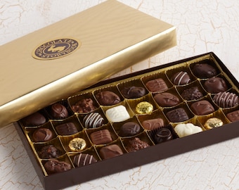 Coffret cadeau assortiment de chocolats dorés