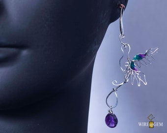 Stainless Steel bird earrings with epoxy element and Amethysts teardrop.