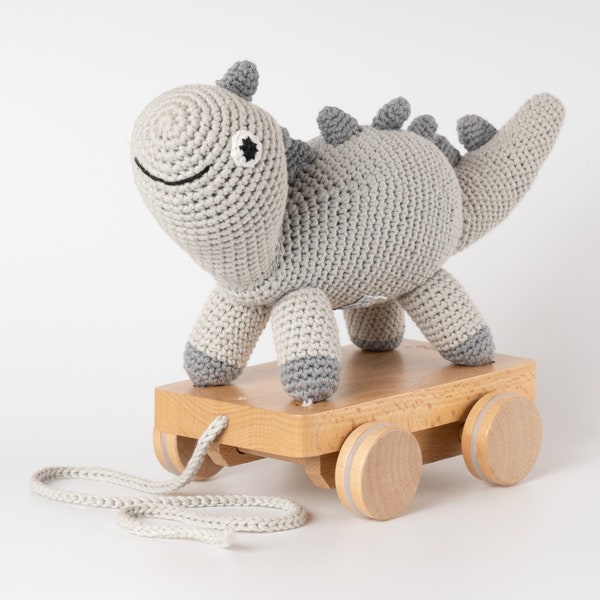 Doudou DINO le Dinosaure sur roues ( gris), Sindibaba