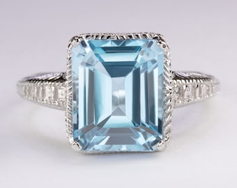 Pierścionek w stylu vintage z niebieskim topazem w stylu art déco, srebro próby 925, grawerowany solitaire (18282-SKYBT)