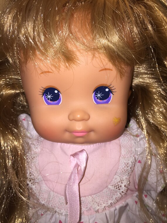 magic face baby doll