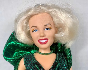 green emerald velvet dress Amazon.com: Marilyn Monroe Collector's Series Emerald Evening Gown Doll by  DSI : Toys & Games main image 0