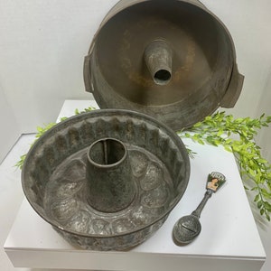 Antique Pair of Primitive Pudding Cake Molds and H J Heinz Pewter spoon