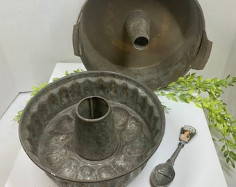 Antique Pair of Primitive Pudding Cake Molds and H J Heinz Pewter spoon