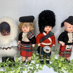 Carlson Eskimo Doll and Three Roddy Scottish Celluloid Dolls Made in England Open Close Eyes