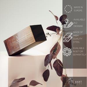 May include: A rectangular wooden block with a dark brown top and a reddish-brown and white textured side. The block is made of high-quality steel and is available in two designs. The product is available in a set or separately.