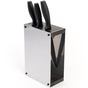 May include: A stainless steel knife block with black knife handles. The block has slots for multiple knives.