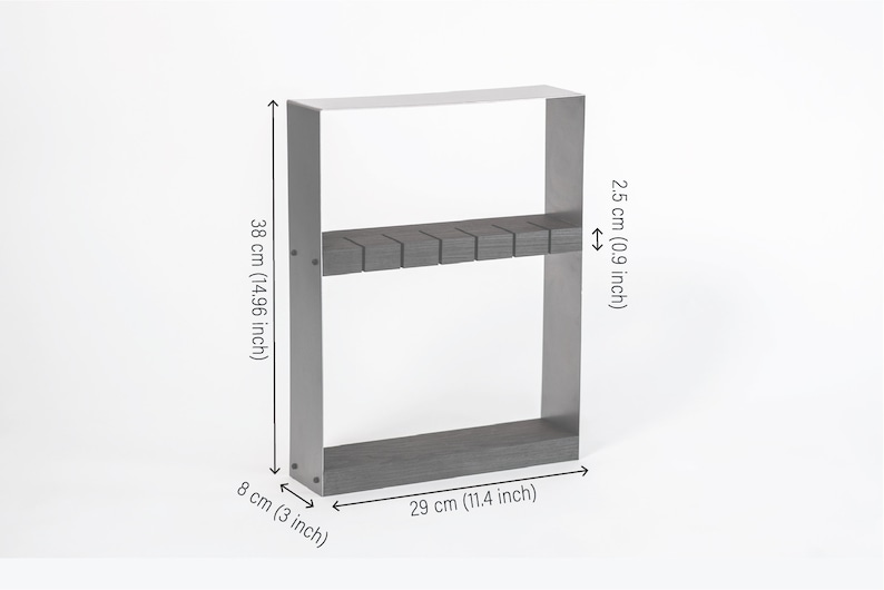 Minimalist knife holder with a black wooden block and silver metal frame, featuring measurements of 38 cm in height, 29 cm in width, 8 cm in depth, and a block thickness of 2.5 cm.
