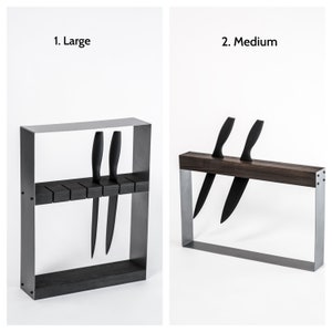 Side-by-side of two knife holders: 'Large' with a tall metal frame holding knives horizontally in the middle, 'Medium' with a wood top holding two knives vertically.