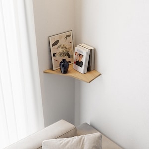 ashwood corner shelf in living room for books and plants in a room interior