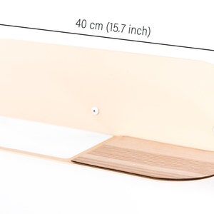 May include: A cream-colored wooden shelf with a rounded edge and a small wooden shelf underneath. The shelf is 15.7 inches wide, 4.7 inches tall, and 3.9 inches deep.