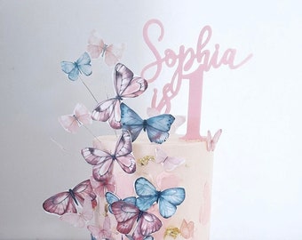 Personalised 1st Birthday Cake topper reads: Name is 1