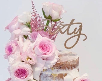 60th Birthday Cake Topper reads: Sixty